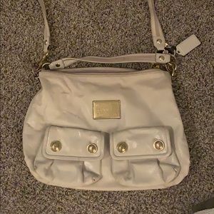 Cream colored coach bag